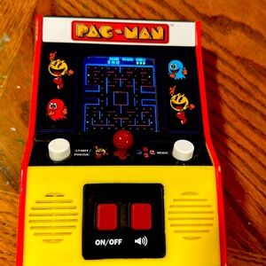Small electronic battery powered PacMan machine